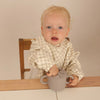 Babero con Manga impermeable Vichy Beige + Babero corto Nenina & Co
