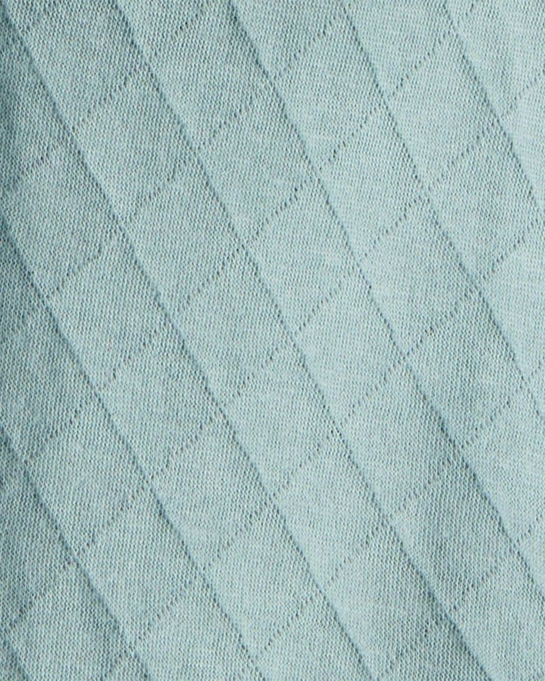 Conjunto 3 piezas con chaleco acolchado y dinosaurio