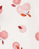 Conjunto de tres piezas en rojo y rosa con estampado de manzana